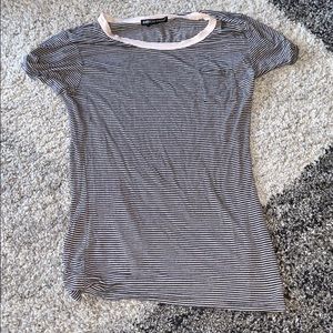 black and white striped shirt with pink outline